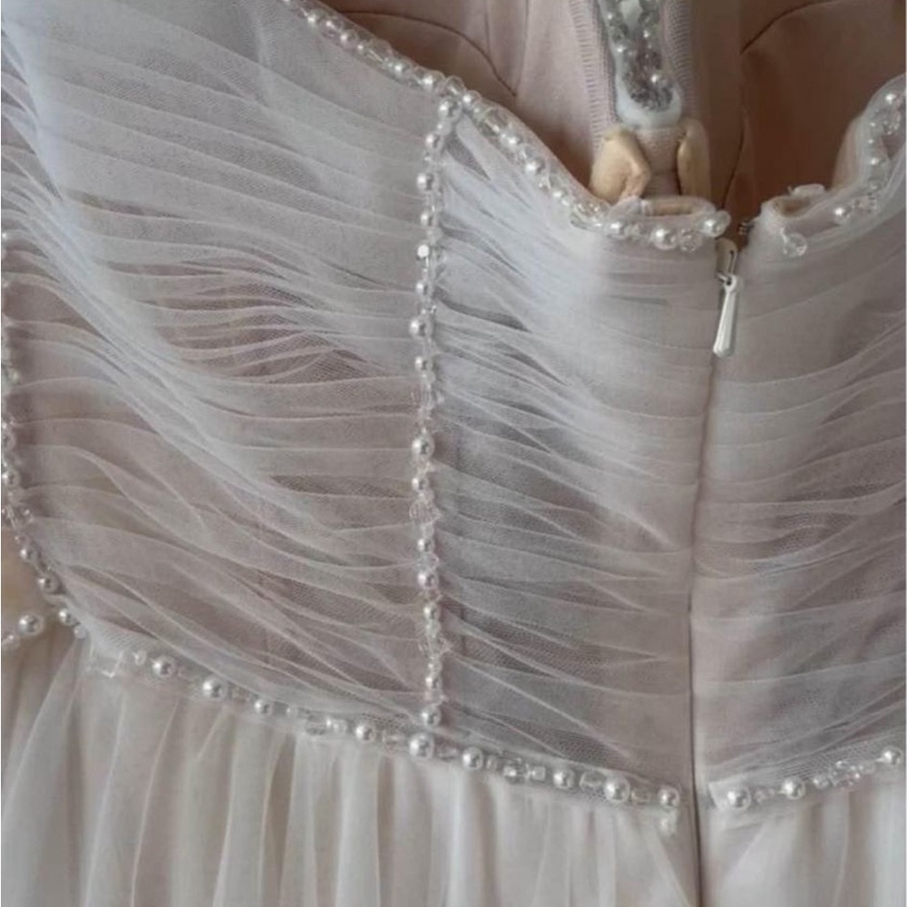 Romanova atelier tulle wedding dress. cleaned. Perfect condition and unaltered.